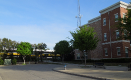 Brick Row Apartments at Spring Valley Station